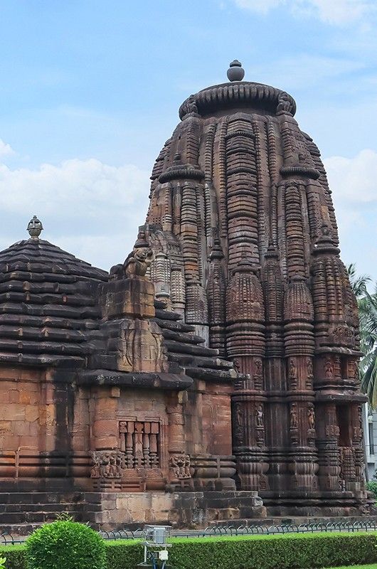 Façade of Jagamohana and Vimana of Rajarani Temple. 11th century Odisha style temple constructed dull red and yellow sandstone, Bhubaneswar, Odisha, India.